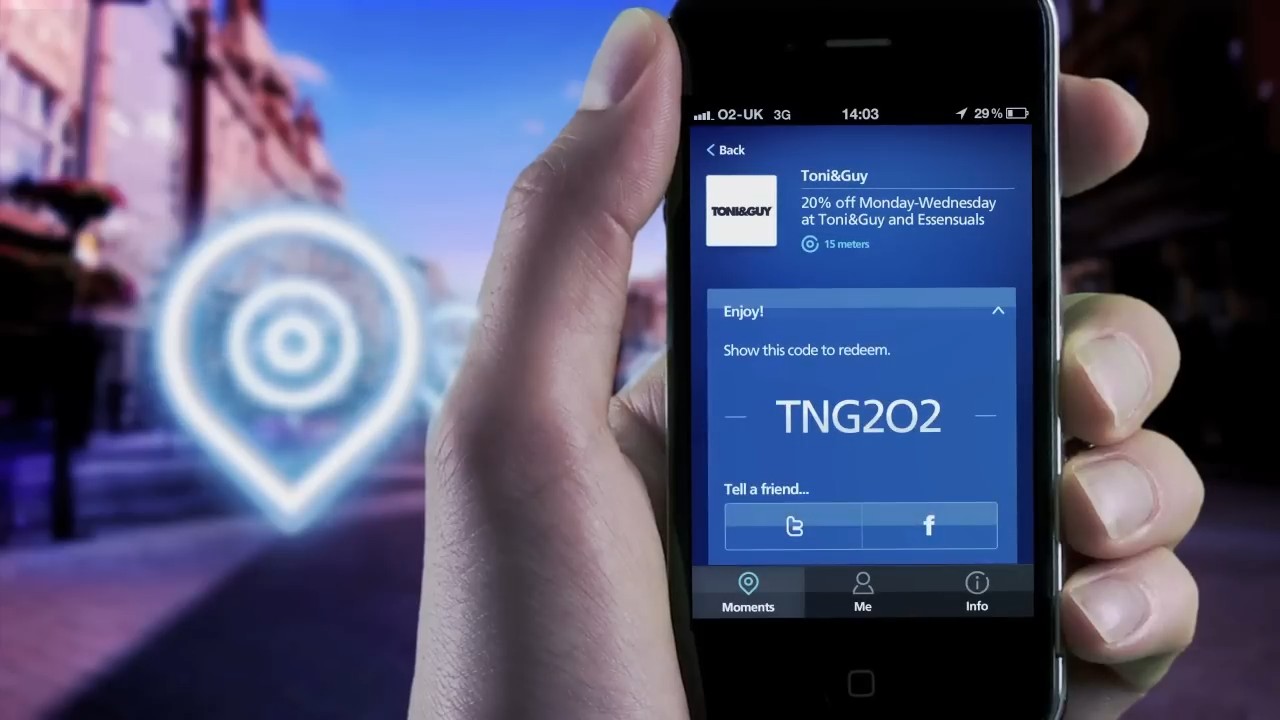 Frame from O2's 2011 launch film: the Toni&Guy offer opened in Priority Moments, showing 'Show this code to redeem' with the code TNG2O2